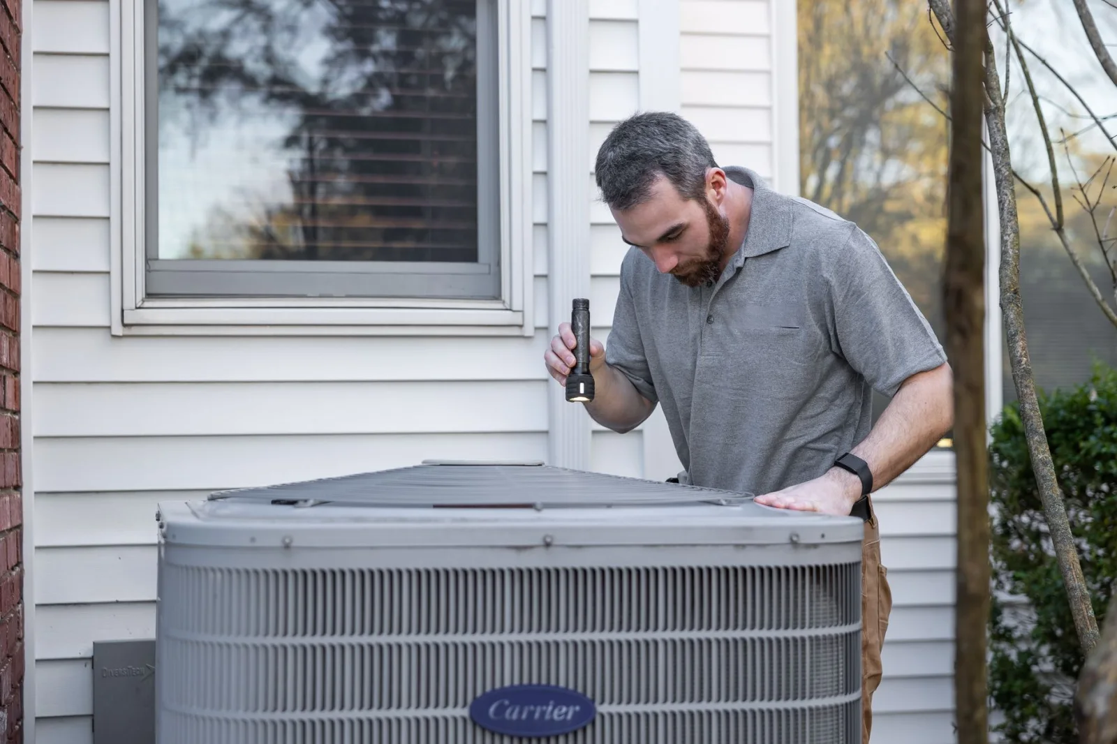 Technician servicing a home in the UAE